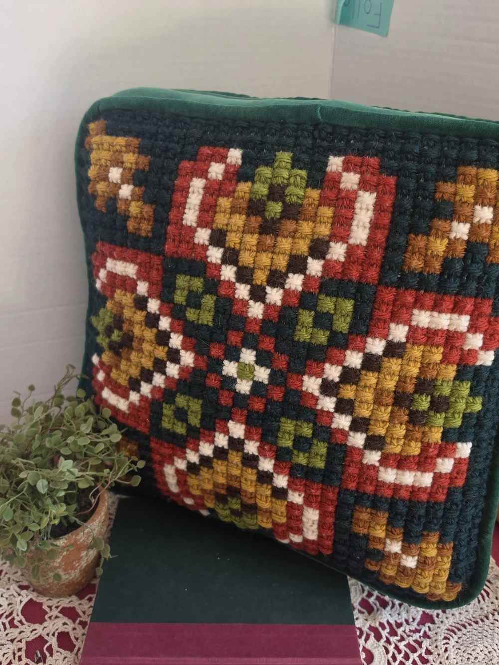 Handmade‎ vintage pillow features a vibrant Scandinavian folk art pattern